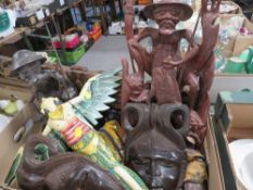 A tray of assorted treen etc. to include Oriental figures, tribal style masks etc
