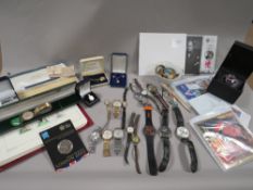 A tray of collectables to include coins and watches plus a folder of GB stamps etc