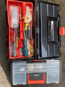 Two plastic Black and Decker two level tool boxes full of tools