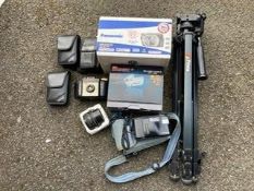 A boxed panasonic VDR D160 video camera, boxed Canonext G video camera, Olympus Trip camera, Kodak