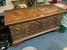 An oak carved small blanket box A/F