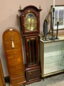 A modern moon roller triple weight long case clock made by Interclock of Belgium