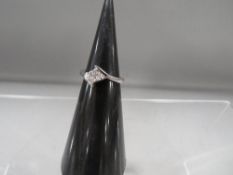 A hallmarked 9 carat white gold diamond set ring set with approx. 0.20 cts of diamonds approx.