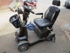 An Excel Galaxy plus mobility scooter with keys and charger - tyres need attention