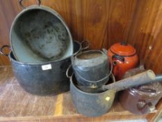 A selection of vintage cooking pots, pans and two kettles