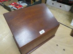 A vintage mahogany stationary box
