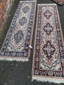 Two Indian woollen runner rugs 213 x 69 cm