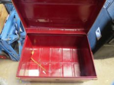 A steel vintage travel trunk