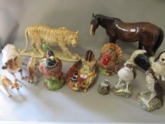 A quantity of animal themed ceramics to include a novelty tea pot in the form of a pheasant