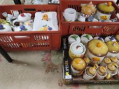 Three trays of kitchen ceramics to include storage jars etc