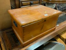 A small antique pine blanket box with twin handles W 53.5 cm