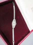 A hallmarked 9 carat gold vintage diamond set watch approx weight 21.1g