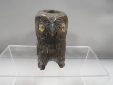 A black forest style inkwell in the form of an owl