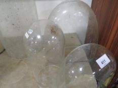 Three small glass domes