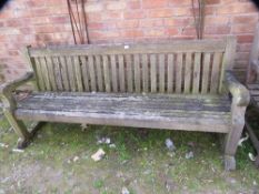 One heavy hardwood garden bench