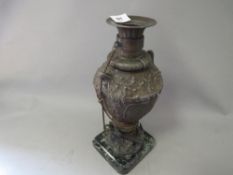 A bronze style Sauvetage ship design vase on marble base