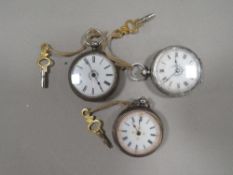 Three antique silver cased ladies pocket watches