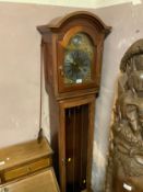 A modern interlock triple weight long case clock with pendulum