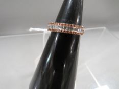 A hallmarked 9 carat gold diamond and cognac diamond ring approx. weight 2.8g