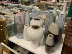 A large constant of modern show home vases to include glass examples