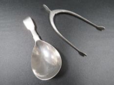 A hallmarked silver caddy spoon together with a pair of hallmarked silver wish bone sugar tongs (2)