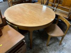 A mid-century Nathan teak extending table and four chairs A/F