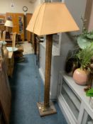 A modern heavy brick effect standard lamp