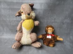 A VINTAGE MERRYTHOUGHT MUSICAL 'THUMPER' SOFT TOY, H 41 cm, together with a musical Music Reuge bear