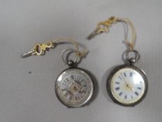 Three antique silver cased ladies pocket watches