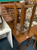 An Edwardian occasional table together with a walnut pedestal table and an oak stick stand