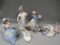 Five Nao figures to include a ballerina