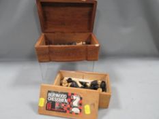 Two boxed wooden chess sets