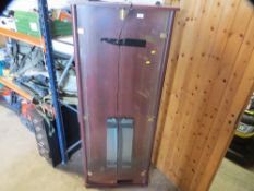 A modern display tall wall cabinet with glass shelves and light