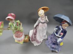 Three Royal Doulton figurines to include 