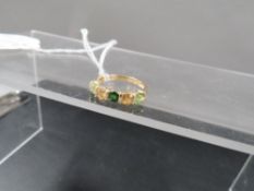 A hallmarked 9 carat gold multi stone dress ring approx weight 2.2g