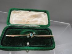 A Hallmarked 9 carat gold bar brooch approx. weight 2.3g