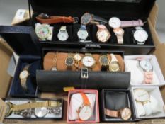 A tray of over 20 assorted wrist watches