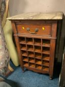 A modern marble topped colonial style wine rack cabinet