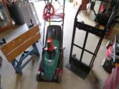A Bosch electric lawnmower, Flymo strimmer, sack track and a Black & Decker workmate - house