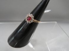 A ruby and diamond ring stamped 14k approx. weight 2.4g