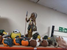A selection of assorted resin figures to include an iguana and native American Indian etc