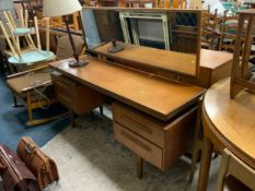 A mid century G-Plan teak dressing table