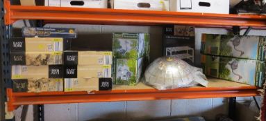 A selection of boxed items to include shelf storage shelves, lamp shades and decorative garden