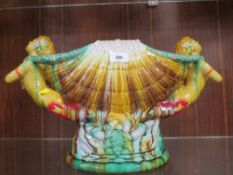 A reproduction majolica conch shell centre piece