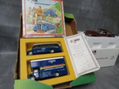 TWO BOXED DANBURY MINT 1964 ASTON MARTIN DB5 1:24 SCALE, together with a Corgi 'We're on The Move'