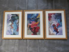 A matched set of three framed and glazed abstract oil paintings signed Sucher and marked Portugal to