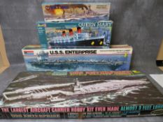 FOUR SHIPS MODEL KITS, to include Aurora USS Enterprise aircraft carrier with instructions and