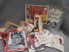 A quantity of old collectable newspapers together with vintage patterns