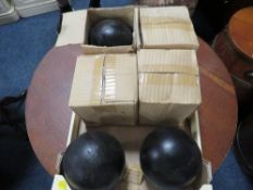 Six reproduction cast metal cannon balls