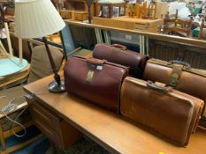A retro cowhide case to go with another similar and a mahogany table lamp with three modern baskets
